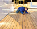 Times gone by: A Wolz Nautic employee checks the joints between the wide bars. The length of the planks suggests Burma teak