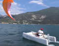 The X-Fun is designed to be sailed with the 10 square metre kite; the shaft of the electric outboard serves as a rudder.