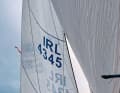 Warped:  In this picture the forestay is too loose, the luff is too round, and the headsail has a deeper profile than the sailmaker intended