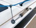 Borrowed from ocean racing: Headsheet guide made of cordage and thimbles