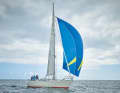 Jibing - the gennaker sheets run outside the sail and tackle line