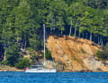 Sheltered anchorage off the steep coast at Fakkegrav on the north side of the fjord
