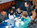 The changing crews include students, scientists and journalists