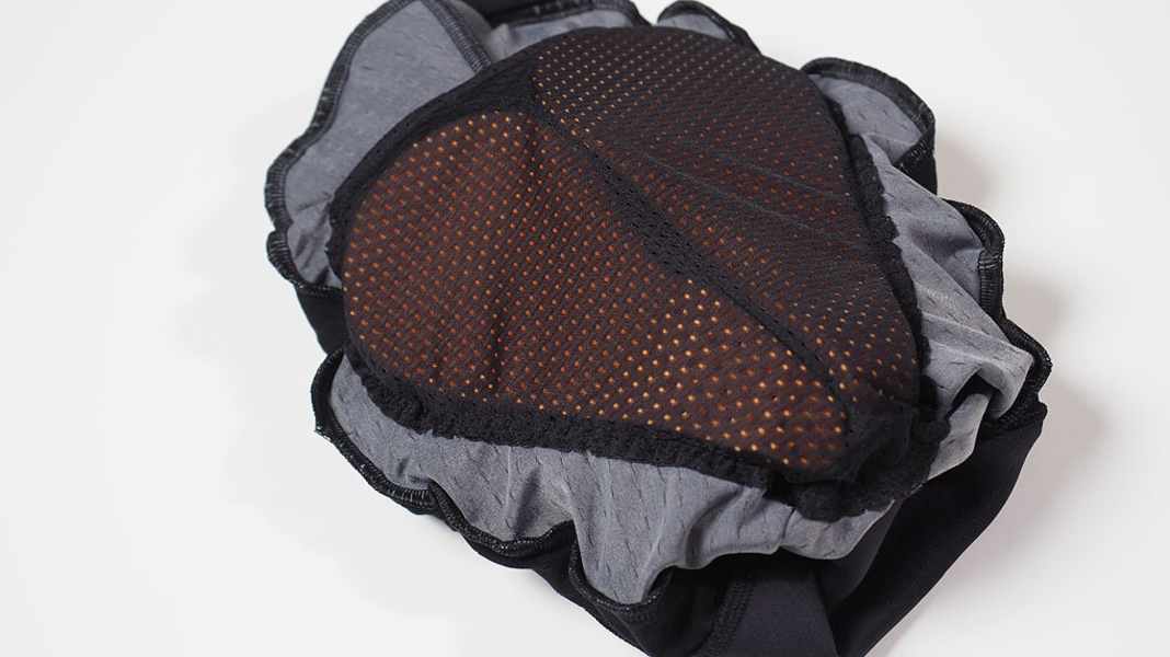 Custom cycling shorts with selectable seat pad
