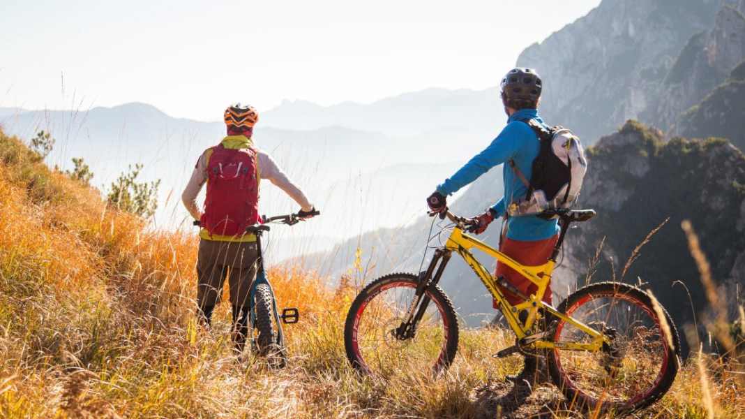 Mountain biking through autumn in Trentino