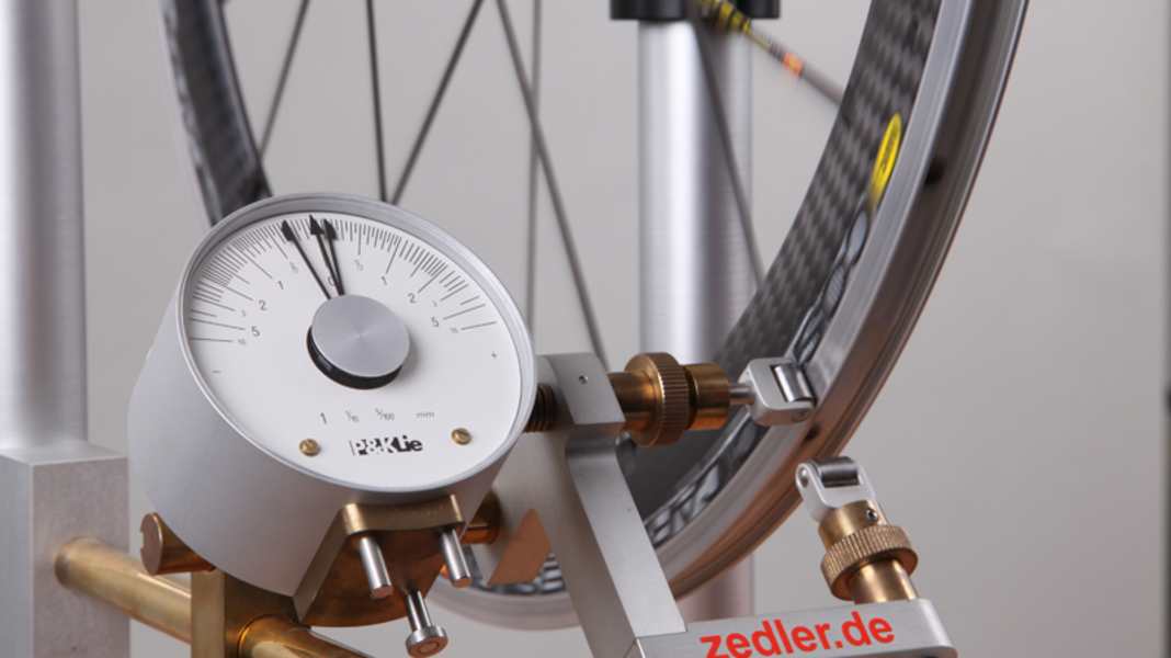 Centre the wheel, tension the spokes