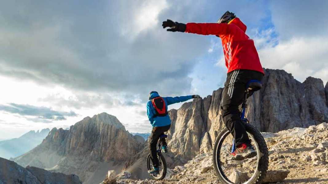 Climbing a three-thousand metre peak on a unicycle