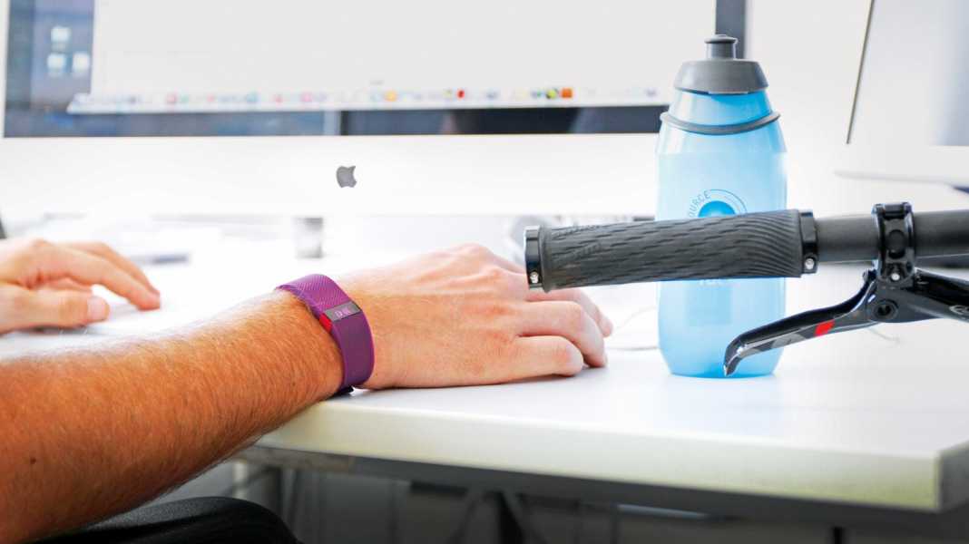What are the benefits of fitness trackers for cyclists?
