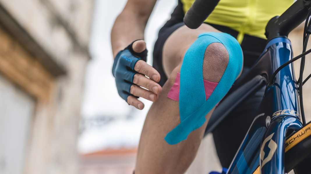 Colourful tapes to stick on: What are the benefits of kinesio tapes in cycling?