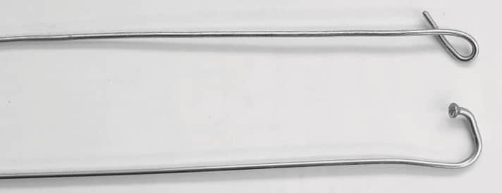 Do it yourself: Tools can be made from wire or an old spoke to achieve internally routed cables on a mountain bike.