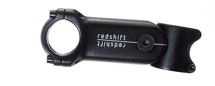 Der <a href="https://www.awin1.com/cread.php?awinmid=11768&awinaffid=471469&clickref=T+Redshift+Shockstop+Pro-Vorbau&ued=https%3A%2F%2Fwww.rosebikes.de%2Fredshift-shockstop-gefederter-vorbau-6-grad-2689435" target="_blank" rel="noopener noreferrer">Redshift Shockstop Pro-Vorbau</a>* bietet 20 Millimeter Federweg