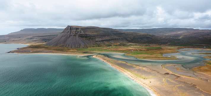 Barðastrandarsandur - almost a Fatamorgana: white sandy beach on the otherwise black volcanic island.