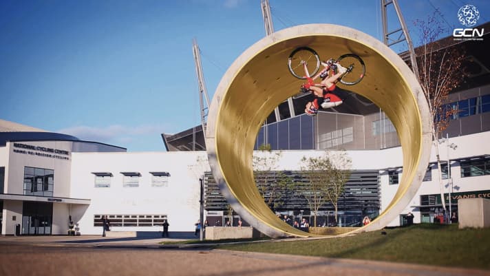   Trials superstar Danny MacAskill takes the loop with aplomb, even on a racing bike.