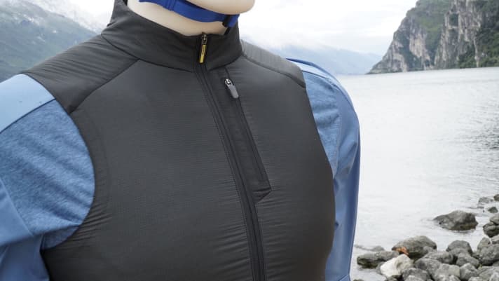   The cut is tight at the shoulders. One breast pocket offers little storage space.