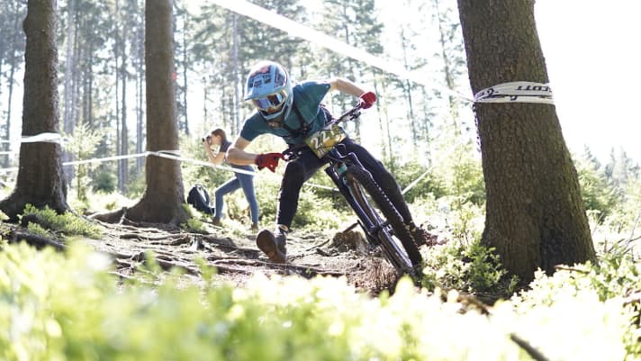   Questionable style but correct cornering.