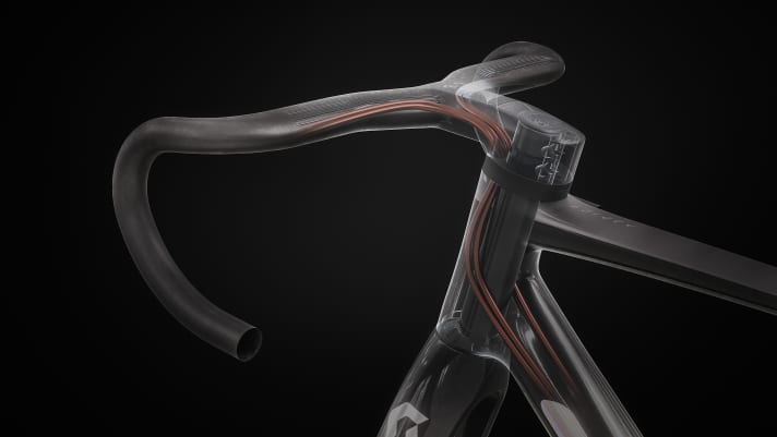   The 3D model shows the cable routing in the stem and head tube.