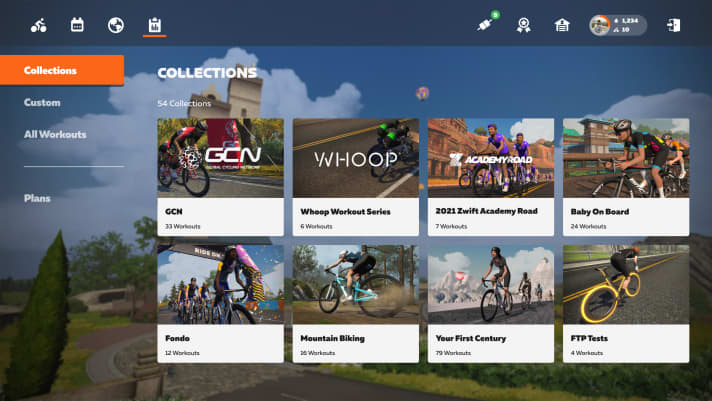 Sur le nouvel écran d'accueil Zwift, les onglets en haut à gauche permettent d'accéder rapidement aux événements, aux courses de groupe et aux entraînements. En haut à droite, on accède facilement aux appareils couplés ou au Drop Shop. | Fabricant