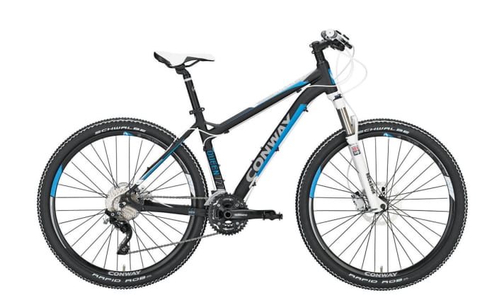Conway MQ 727 27,5": Preis 929,95 Euro; Rahmen Alu; Gewicht* 13,2 kg; Federweg 100 mm; Gabel Rock Shox XC 30 TK; Schaltung/Bremse/Laufräder Shimano XT, Deore 3x10/Shimano M395/Shimano Naben mit Conway-Felgen; Grössen zwei, von 42-46 cm