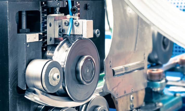   The initially straight profile strands are then carefully bent, cut and welded or inserted into rings to form the rim. Only then are the spoke holes drilled.