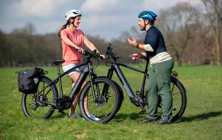 Assisted touring e-bikes are perfect for balancing out different levels of performance over long distances.
