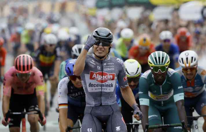 Jasper Philipsen celebrates his victory on stage 10 of the Tour de France 2024