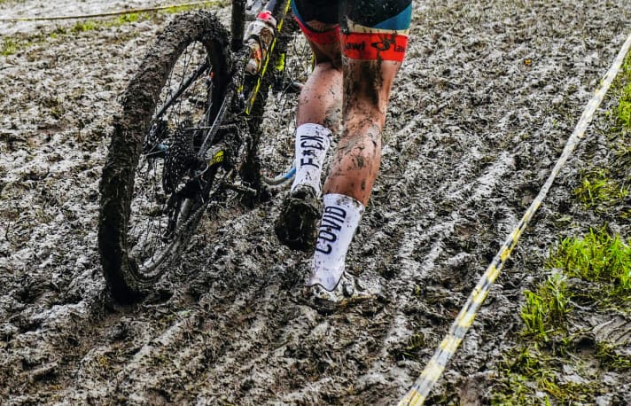 Mud all over it: Riding was out of the question for long stretches at this year's cross-country championships. From page 78