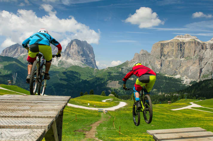   Beautiful freeriding: In the Fassa Bikepark, it's not just the track with drops, berms and jumps that gives you an adrenaline rush - the landscape is like a photo wallpaper and also creates stokeness - guaranteed!