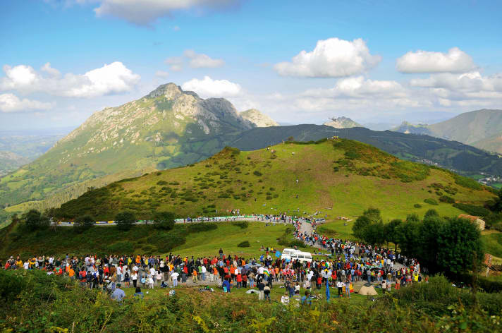 Open-air stage: fans wait for hours on the up to 24 per cent steep ramps of the Angliru to cheer on the racers