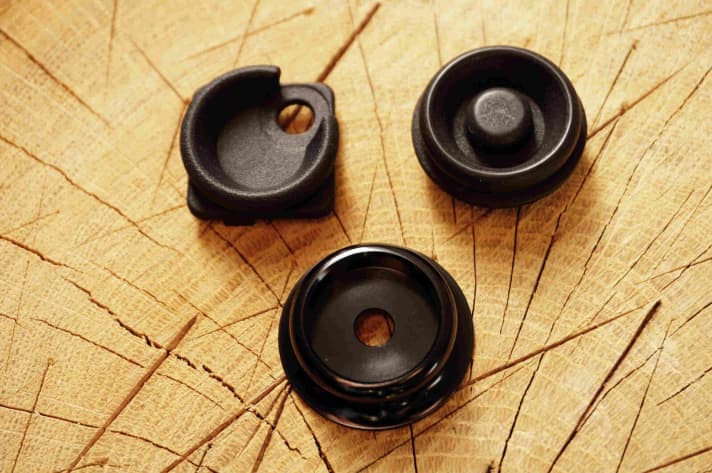   Clockwise from top left: Beer Your Bike High Direct Mount cover, Air Top Cap and the classic Top Cap at the bottom.