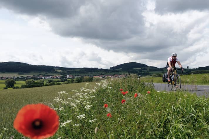   Agricultural land: meadows, fields, pretty villages - along the former border, as here in the Rhön, Germany remained rural 