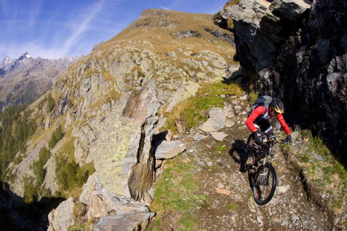   Provided you have a head for heights and know how to manoeuvre, the old mule track is completely rideable.