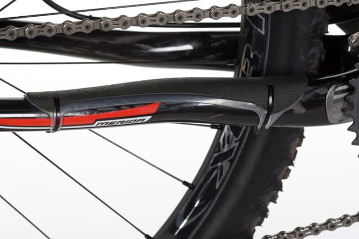   The lightweight carbon frame is fitted with the necessary protective adhesives.