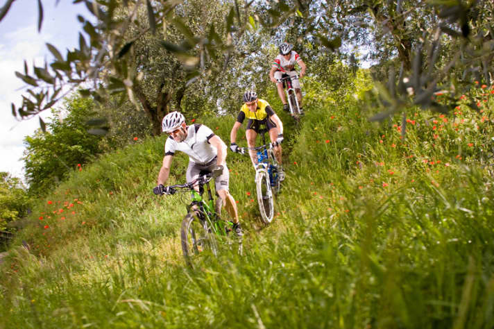   In downhill, the big bikes have the edge