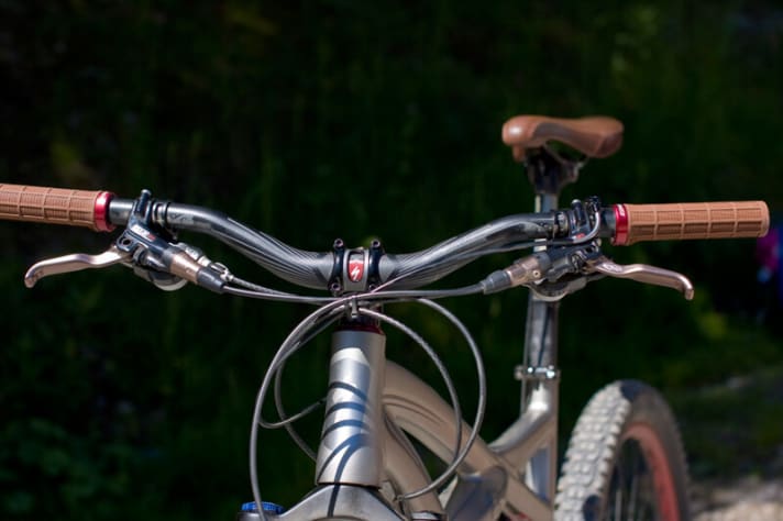   Even with protruding grips, the 690 handlebars are too narrow for an enduro bike and could be flatter.