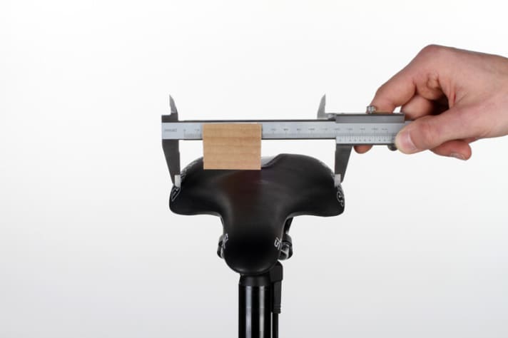   If neither advice nor test saddles lead to the perfect saddle, you can use a modified caliper to estimate the effective saddle width.
