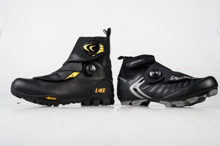   Lake vs Specialized: The size comparison shows the extremes. The high shaft of the Lake interferes with pedalling. The low Specialized barely reaches under your winter trousers. Water can get in.