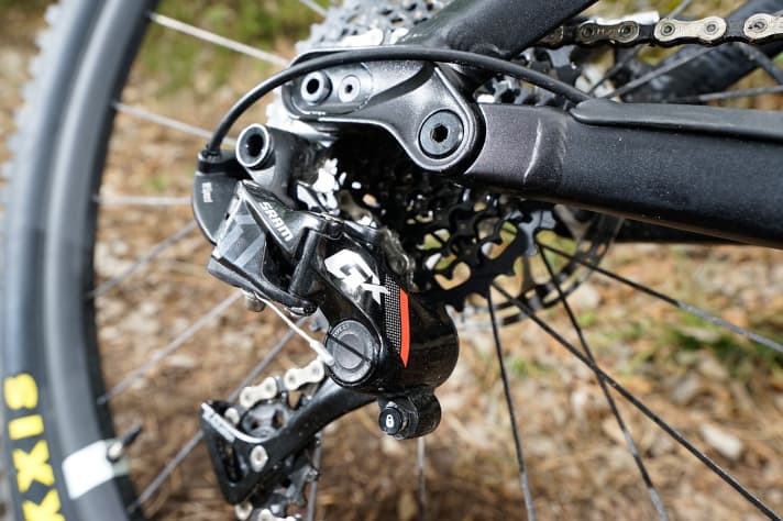   GX rear derailleur with friction damper and cage lock.
