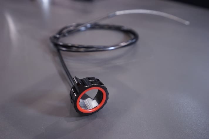   The gear lever is simply mounted on the handlebars and changes gears via a Bowden cable.