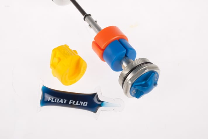   This is what the volume spacers look like on Fox suspension forks. The more spacers, the smaller the volume and the more progressive the fork becomes.