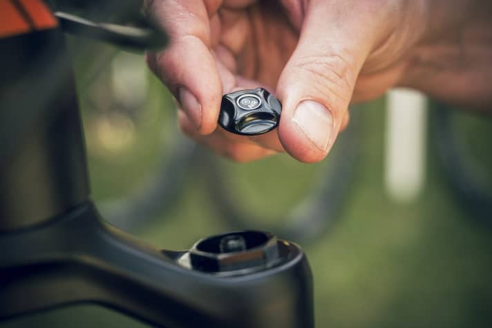   Unscrew the cover cap to access the pressure valve.