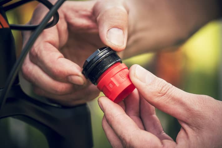   The "Bottomless Tokens" (volume spacers) can be screwed directly into the pressure lid by hand.