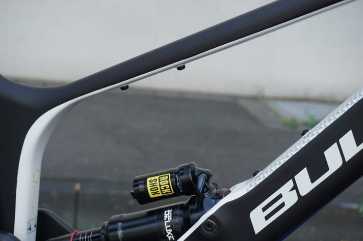   A bottle cage can be attached either to the underside of the top tube or to the down tube in front of the shock. The unused space can be used to attach a minitool or air pump.    