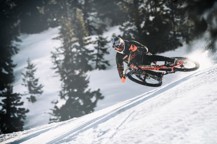   Stay low: Wibmer dances over the crest on his downhill bike like a downhill skier.