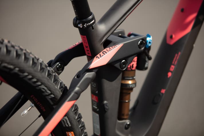   The carbon frame houses a Fox DPX2 rear shock, which provides 140 mm of travel.