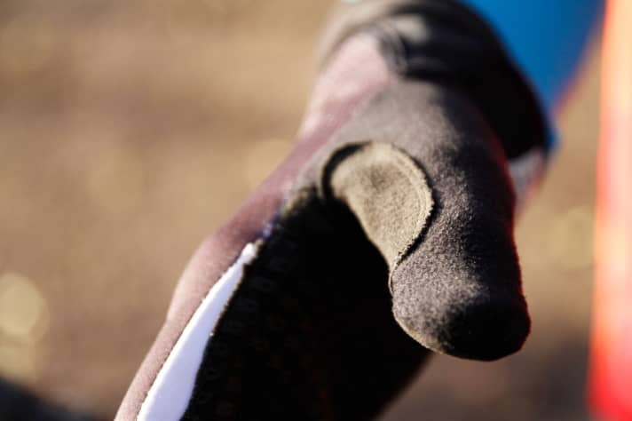   A large towelling attachment on the thumb dries dripping noses or beads of sweat. 