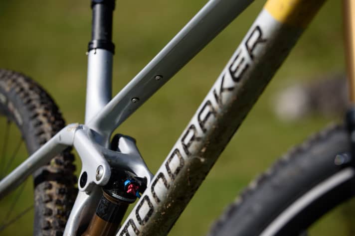   To keep the rucksack at home, a toolkit can be attached to the two bolts under the top tube of the new Raze.