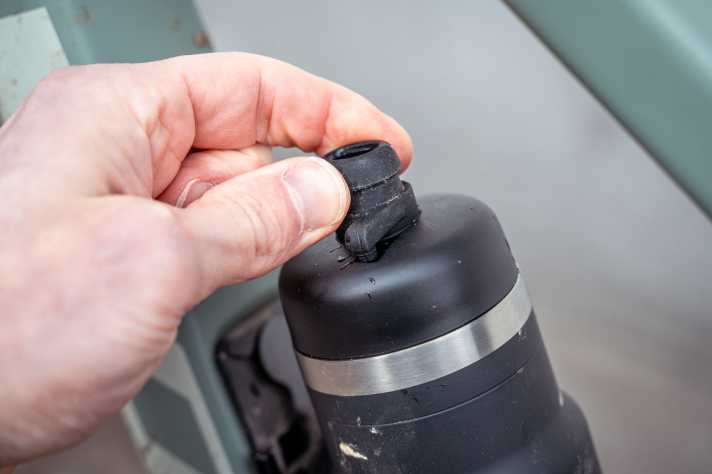The mouthpiece is a little harder to open and close than on many standard plastic water bottles.