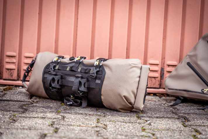 Decathlon charges just under 63 euros for its robust harness and waterproof pannier set