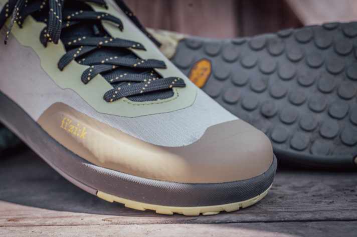 The PU reinforcement on the toe cap extends far back and offers good protection