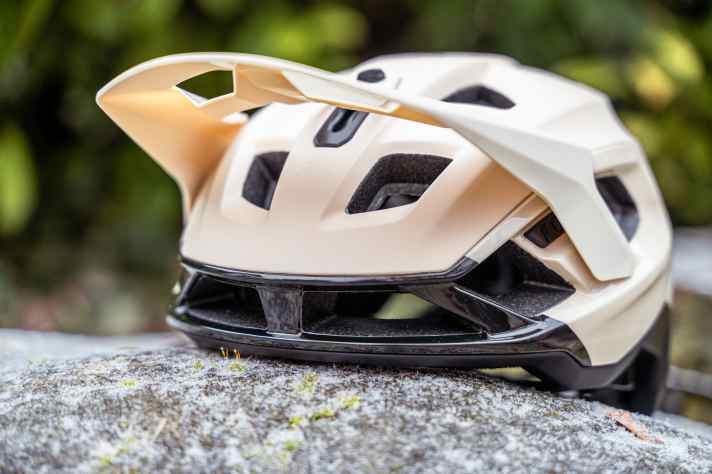 The goggle fits perfectly under the three-way adjustable visor